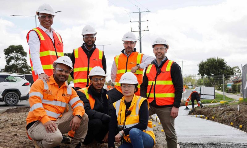 Dr Rajeev Roychand (back left) with BildGroup employees who are RMIT alumna including the CEO Stephen Hill (second from right, at the back) at the site of the Pakenham Roads Upgrade. Credit: Pete Glenane, HiVis Pictures