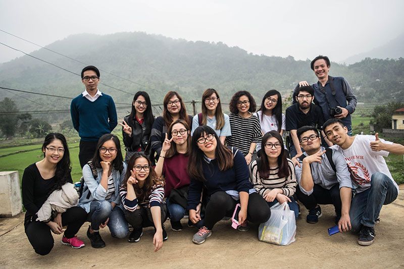 A group of students out in a rural area together.