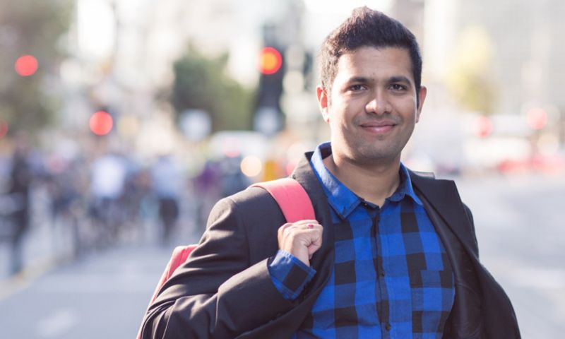 student with backpack