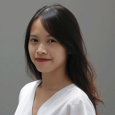 a headshot of a woman smiling 