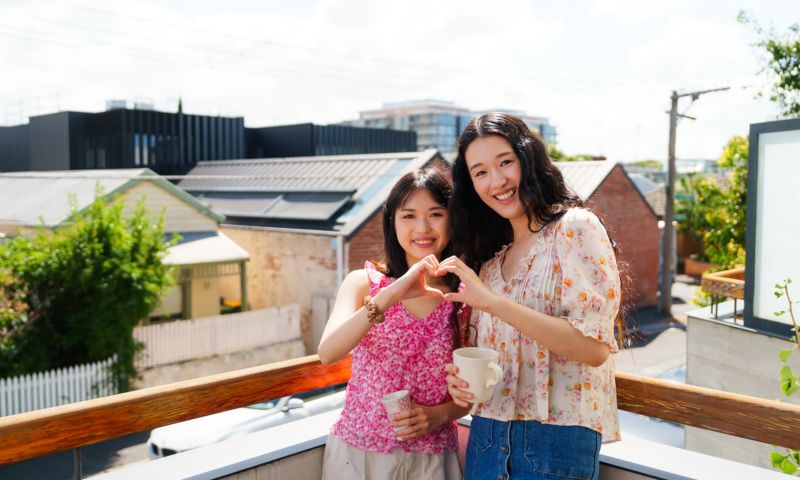 Melody and Priscilla on their balcony in Richmond.