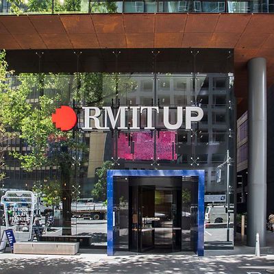 RMIT UP sign on exterior of building 85