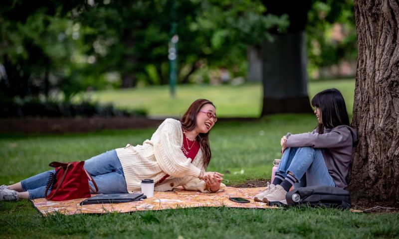 Two students in a park