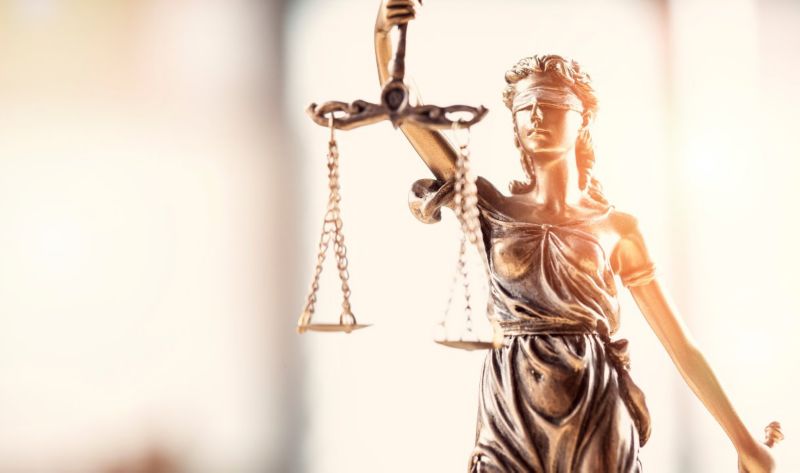 golden lady justice holding scales