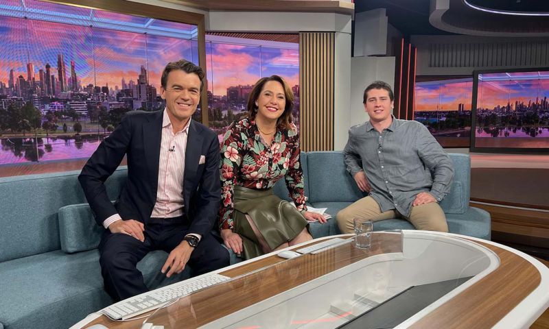 PhD scholar Shannon Kilmartin-Lynch (right) on the ABC News Breakfast couch with hosts Michael Rowland and Lisa Millar after his live interview where he talked about the team's concrete innovation using PPE. Credit: ABC News Breakfast
