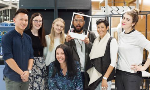 Short course students standing in studio