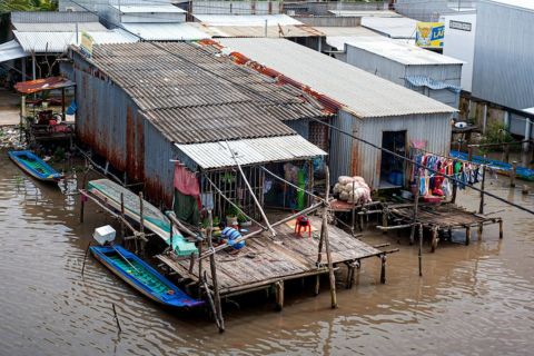 Simple houses by a river