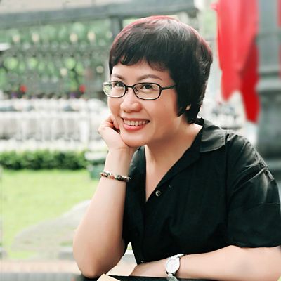 a headshot of a woman smiling 