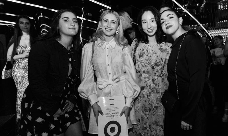 Winning VE Fashion students who worked with Target Australia standing in a group with awards