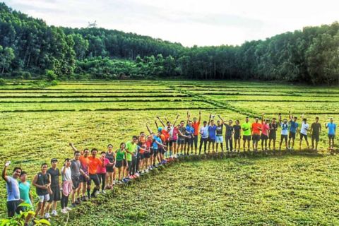 A group of runners in a field.