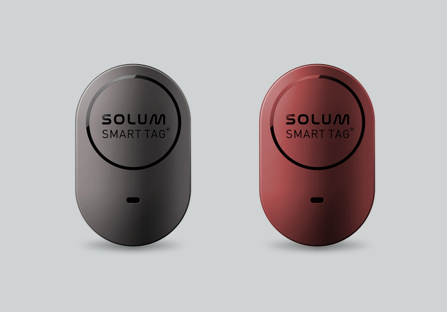 Advanced UWB smart tags in gray and red.