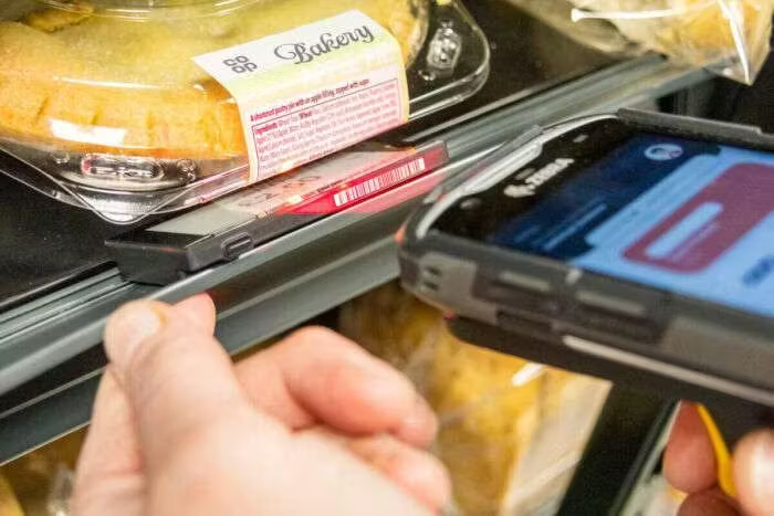 The ESL bottom bar code is being scanned.