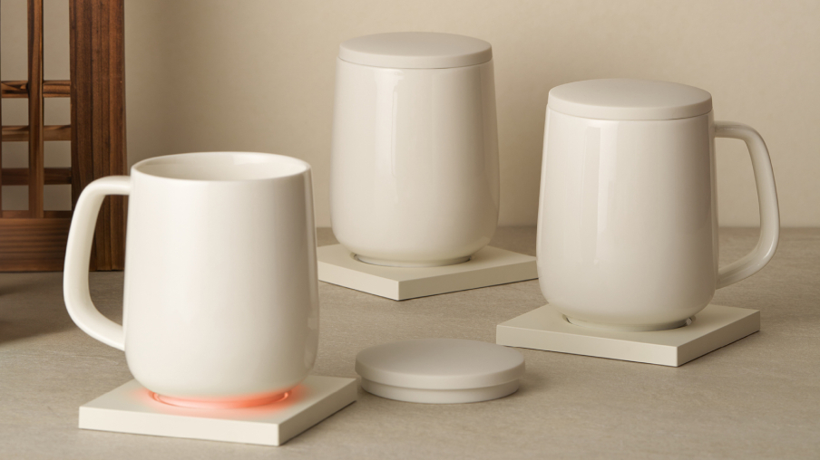 Three ceramic mugs placed on Smart Warmer Mini pads