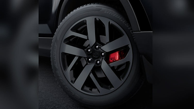 R18 Diamond cut charcoal black alloys with Red Calipers 