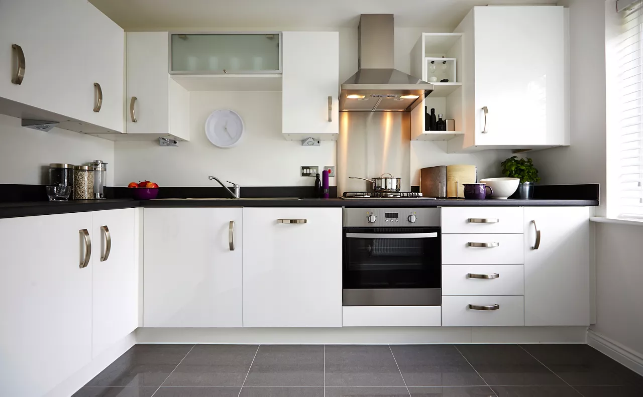 Modern interior of a large kitchen with modular furniture in white color