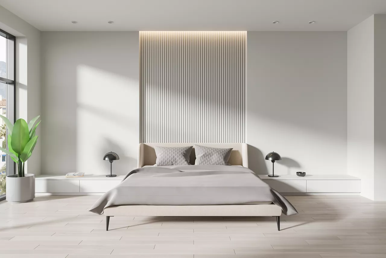White modern hotel bedroom interior with bed, drawer with decoration and plant on hardwood floor. Relaxing space with panoramic window on tropics. 3D rendering