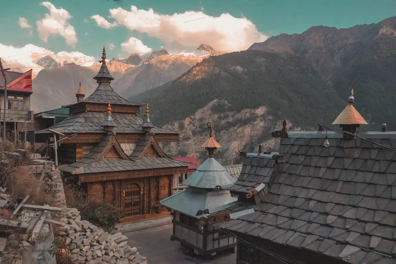 Kalpa, in Himachal Pradesh, India, offers breathtaking views of Kinnaur Kailash. Known for its apple orchards and traditional wooden houses, it embodies Himalayan beauty and tranquility.