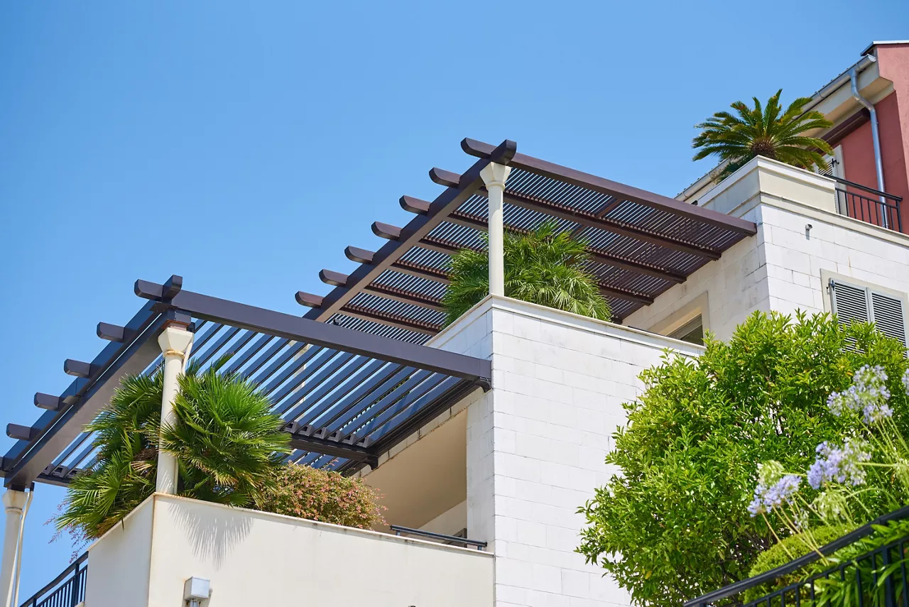 Pergola above the balcony in a modern house