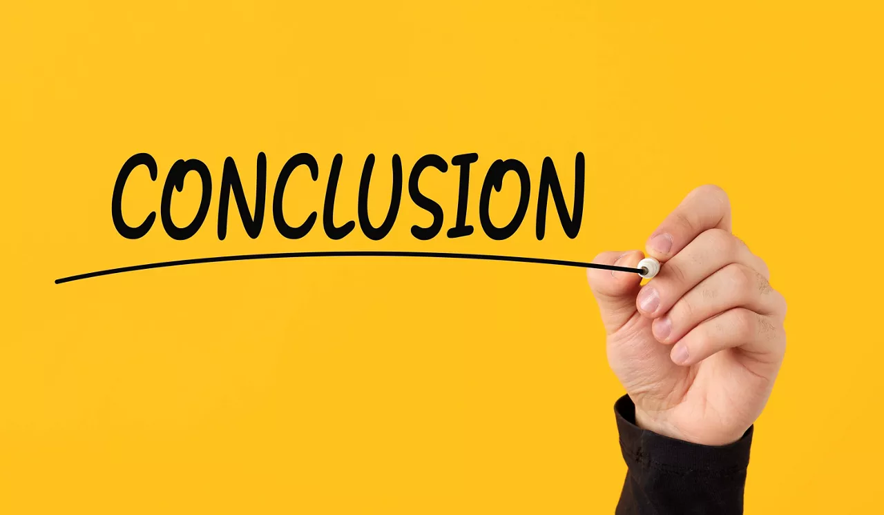 Conclusion and final comments. Results analysis. Final decision or end of an event or process. Male hand draws a line under the word conclusion on yellow background.