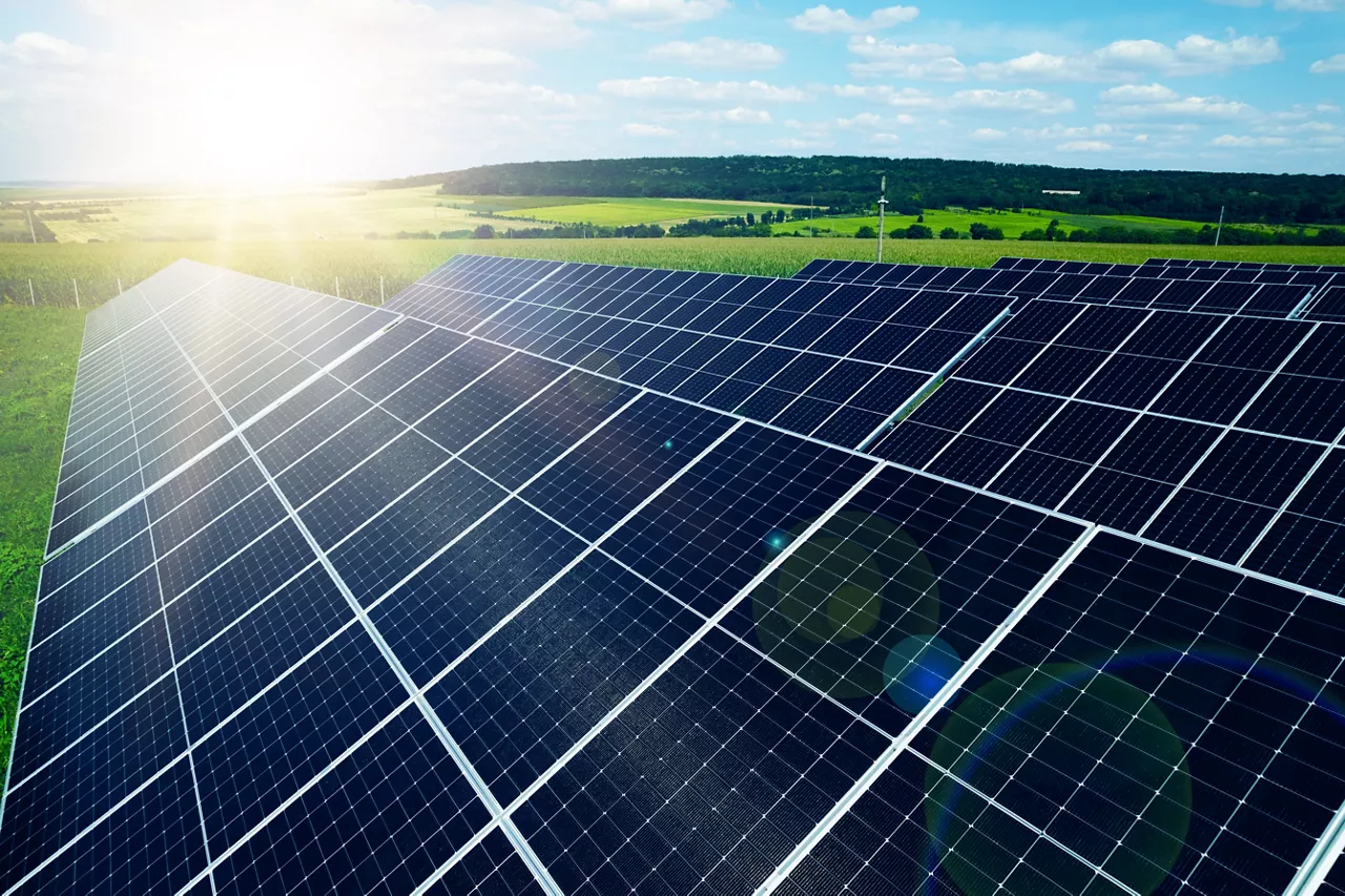 Solar panels park generating green energy electric.Green energy reduce carbon emissions and makes earth cleaner and more ecological.	