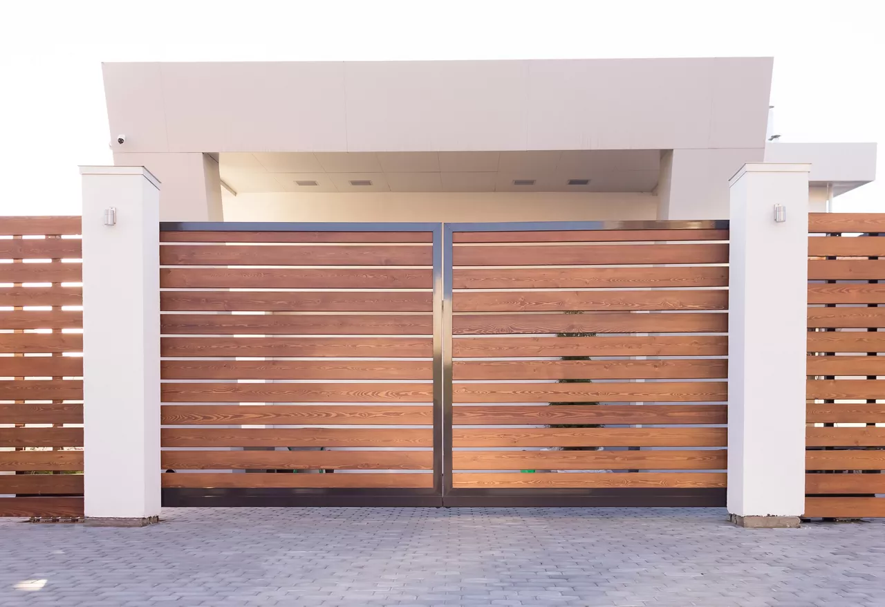 
Automatic sliding gates made of wood in a private house