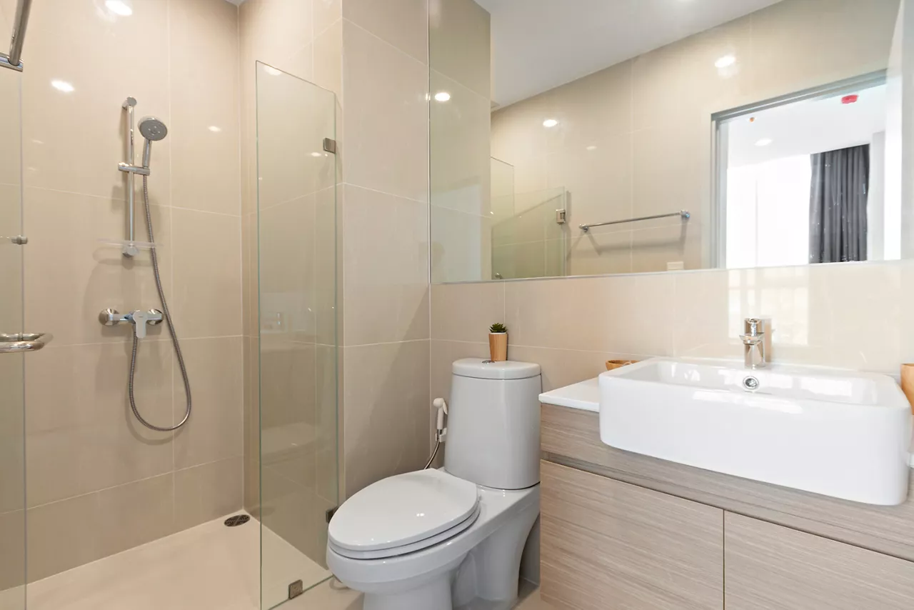 Modern luxury white bathroom interior ,There are marble floor decorated with wooden sink counter