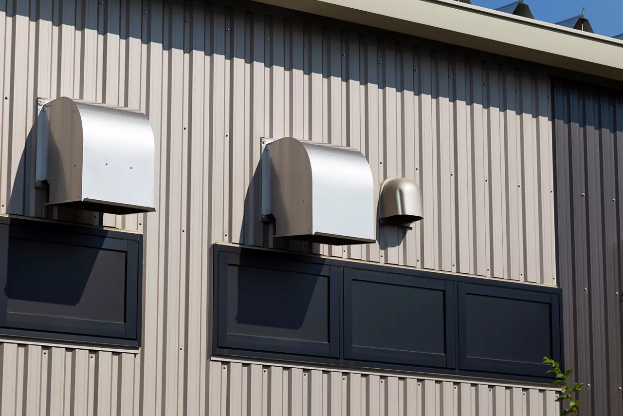 Exterior ventilation hood of a commercial building.
