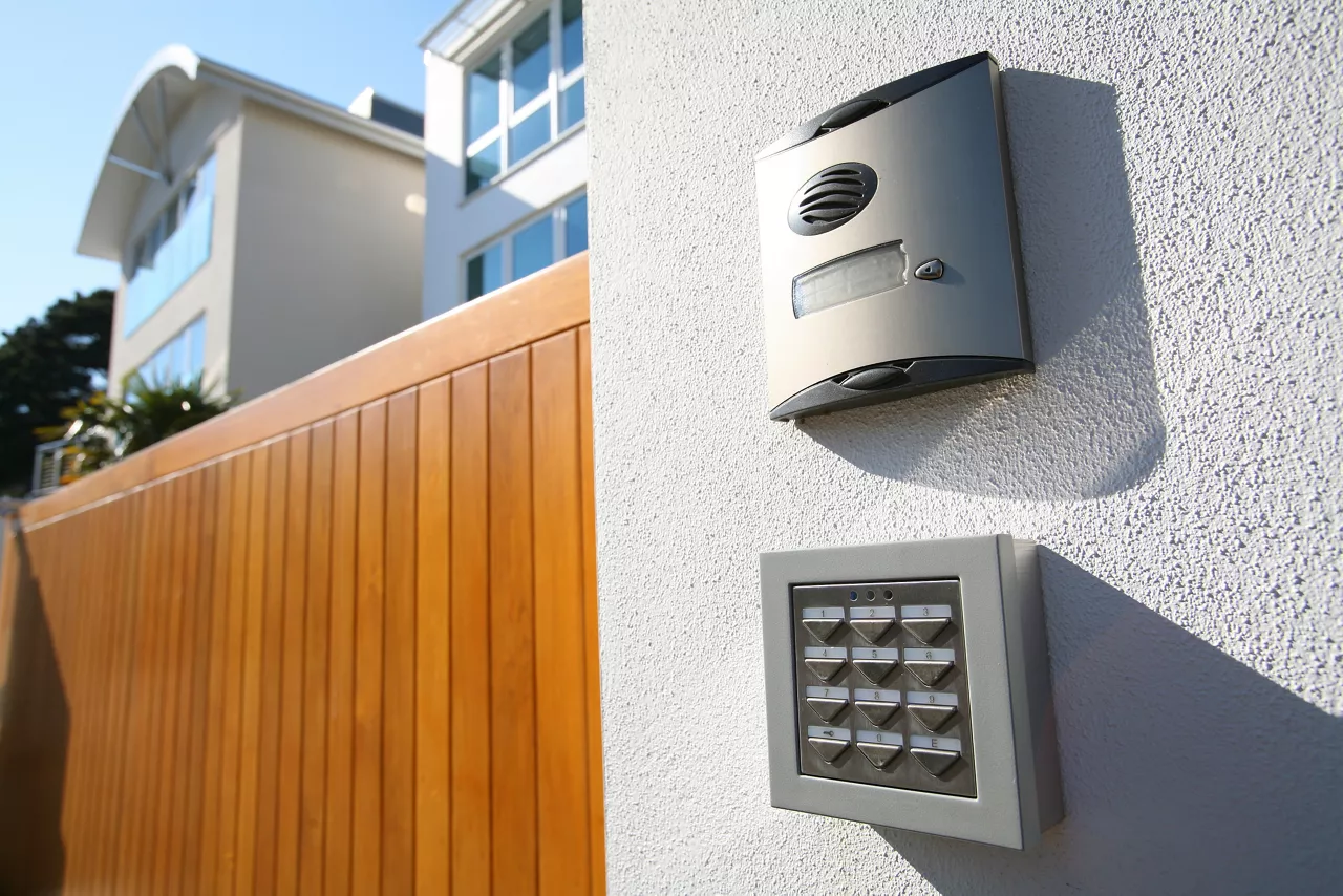 Call box and digitally coded gate lock on new house