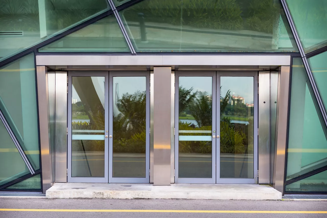 Aluminium Door and Transparency Glass for Entrance/Exit Gate, Modern Architecture of Metallic Aluminum Doorway Frame and Decoration Tempered Glass for Office Building. Architectural of Facade Cladding