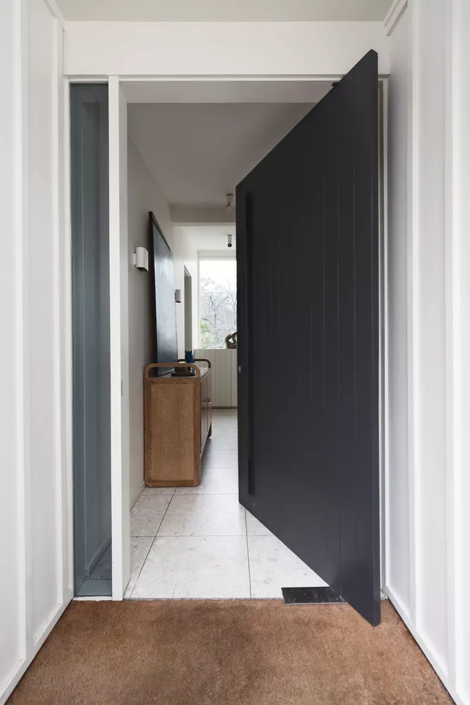 Open front pivot style door to a luxury Australian home