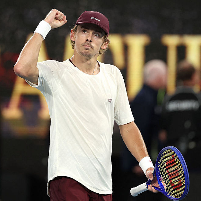 Alex de Minaur celebrates a winning shot