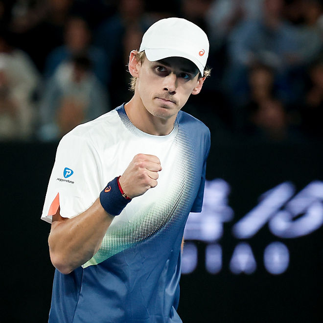 Alex de Minaur celebrates a winning shot