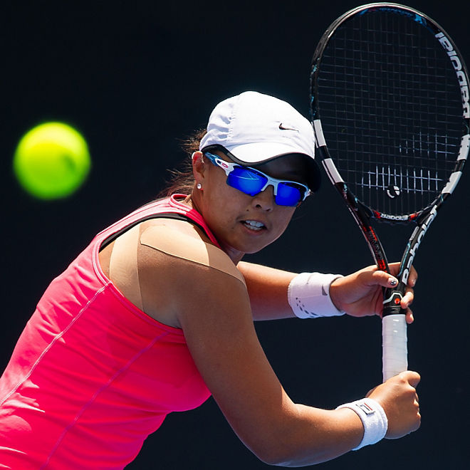 Alison Bai prepares to return the ball