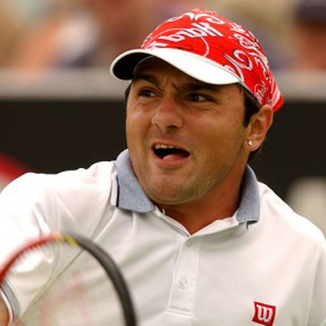 Andrew Ilie playing tennis