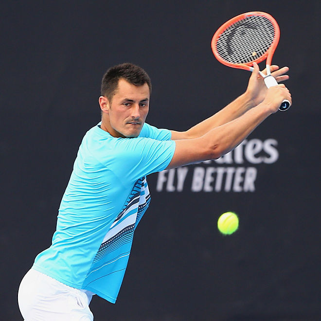 Bernard Tomic lines up a backhand shot