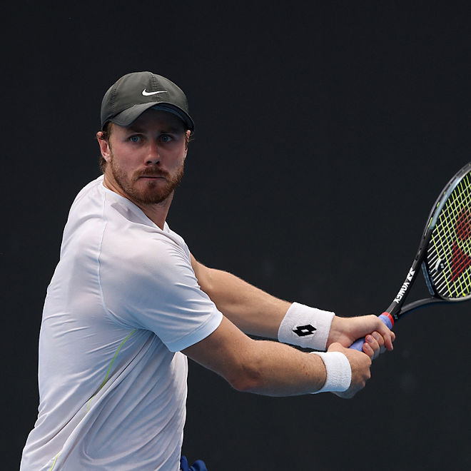 Blake Ellis take a backhand shot