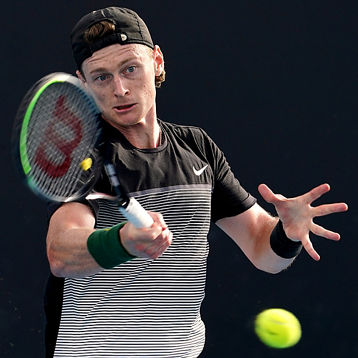 Blake Mott hits a forehand shot