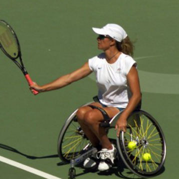 Branka Pupovac hits a shot on court