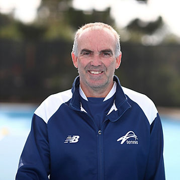Brent Larkham on a tennis court
