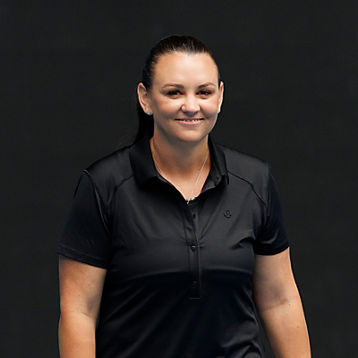 Casey Dellacqua smiles whilst playing tennis