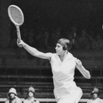 Daphne Akhurst plays a tennis shot