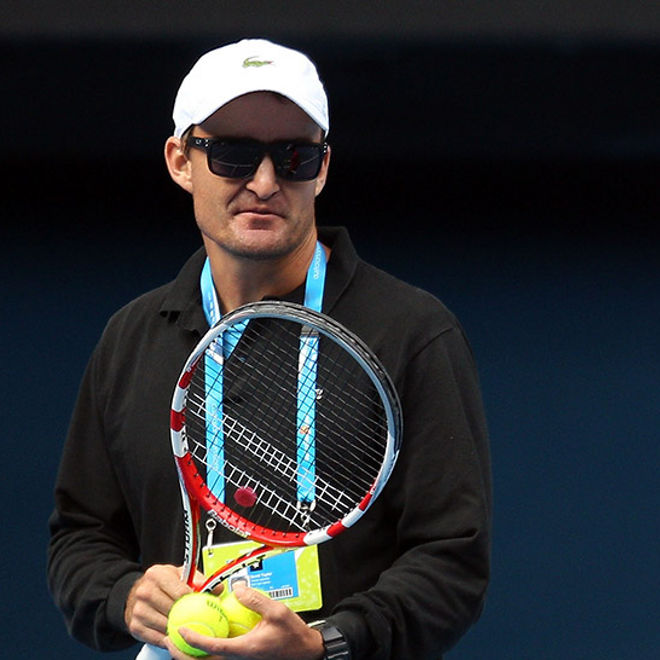 David Taylor stands with Sam Stosur