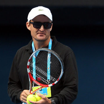 David Taylor stands with Sam Stosur