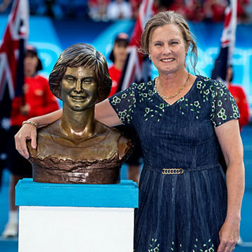 Dianne Balestrat poses with a statue