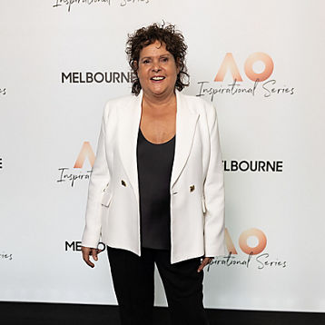 Evonne Goolagong poses at a Tennis event