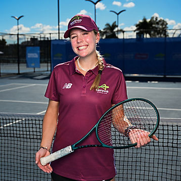 Georgia Campbell poses on a tennis court