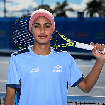 Har Abir sekhon holding a tennis racquet