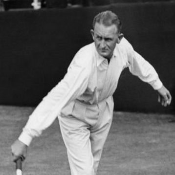 Jack Crawford plays a tennis shot