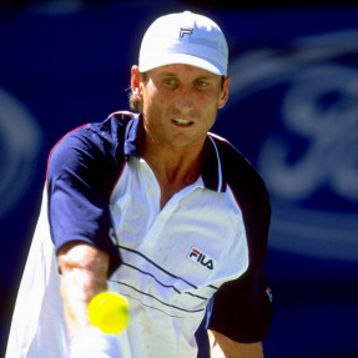 Jason Stoltenberg plays a tennis shot