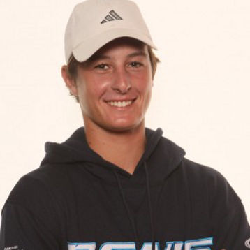 Joey Swaysland stands smiling